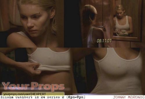 This white tank top was worn by Elsiha Cuthbert as "Kim Bauer" du...