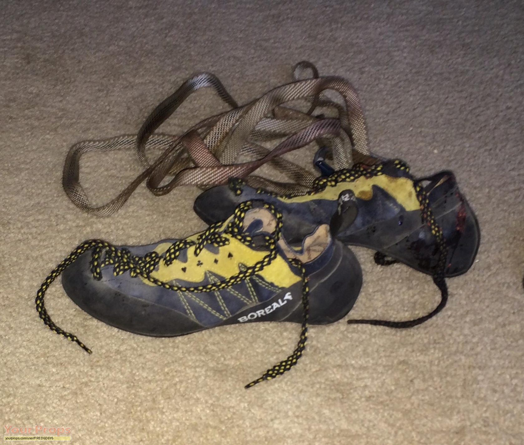 Screen-Used bloody rock climbing shoes 